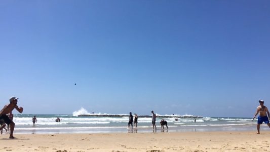 Playing Tennis on the Beach