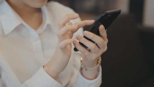 Woman Using Mobile Device