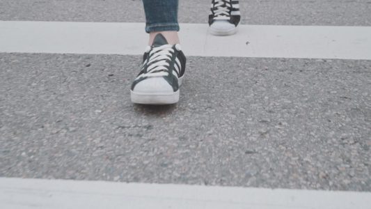 Person Walking in City